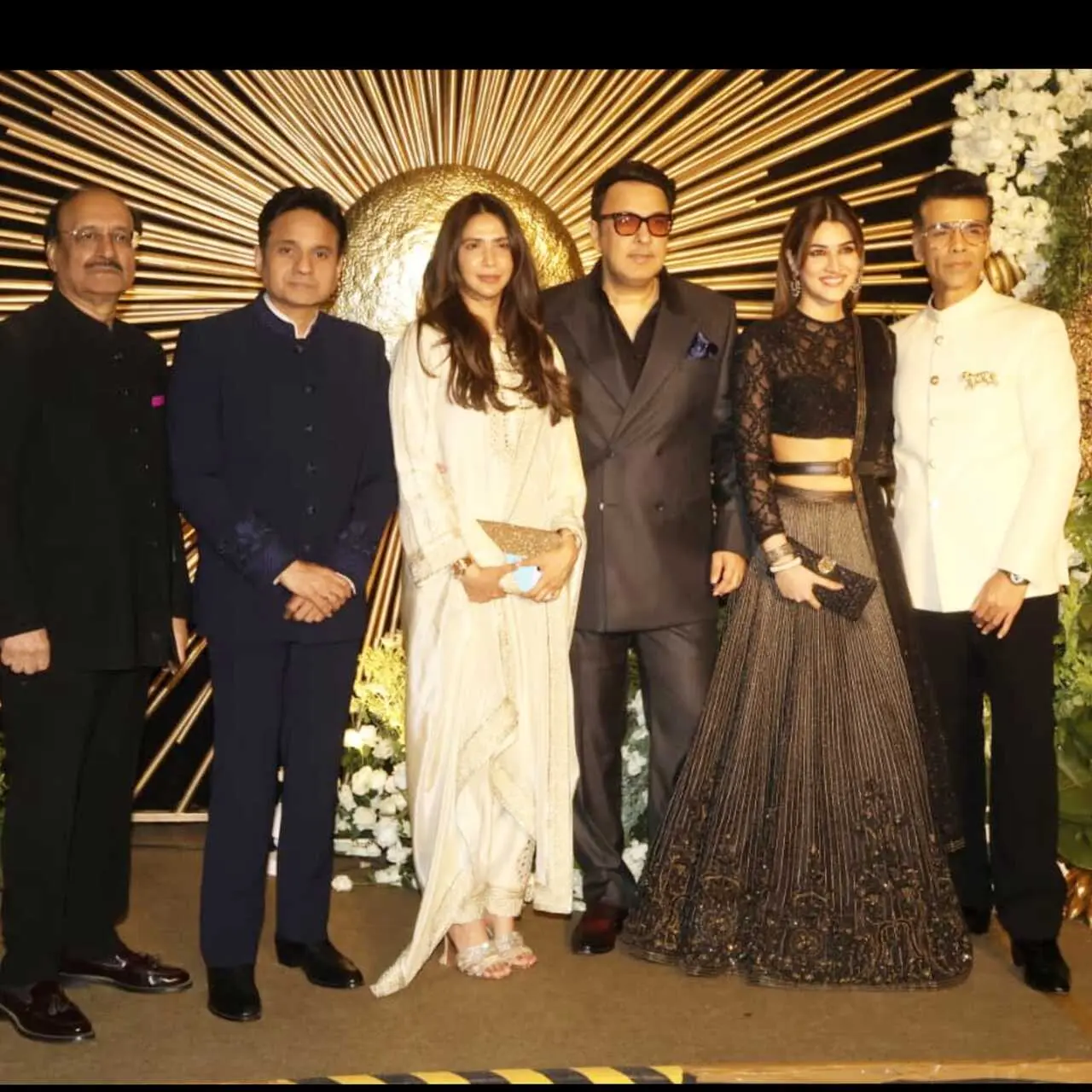 Rashmika's Cocktail 2 co-star Kriti Sanon arrives with Karan Johar, Apoorva Mehta, Dinesh Vijan and others for the reception.